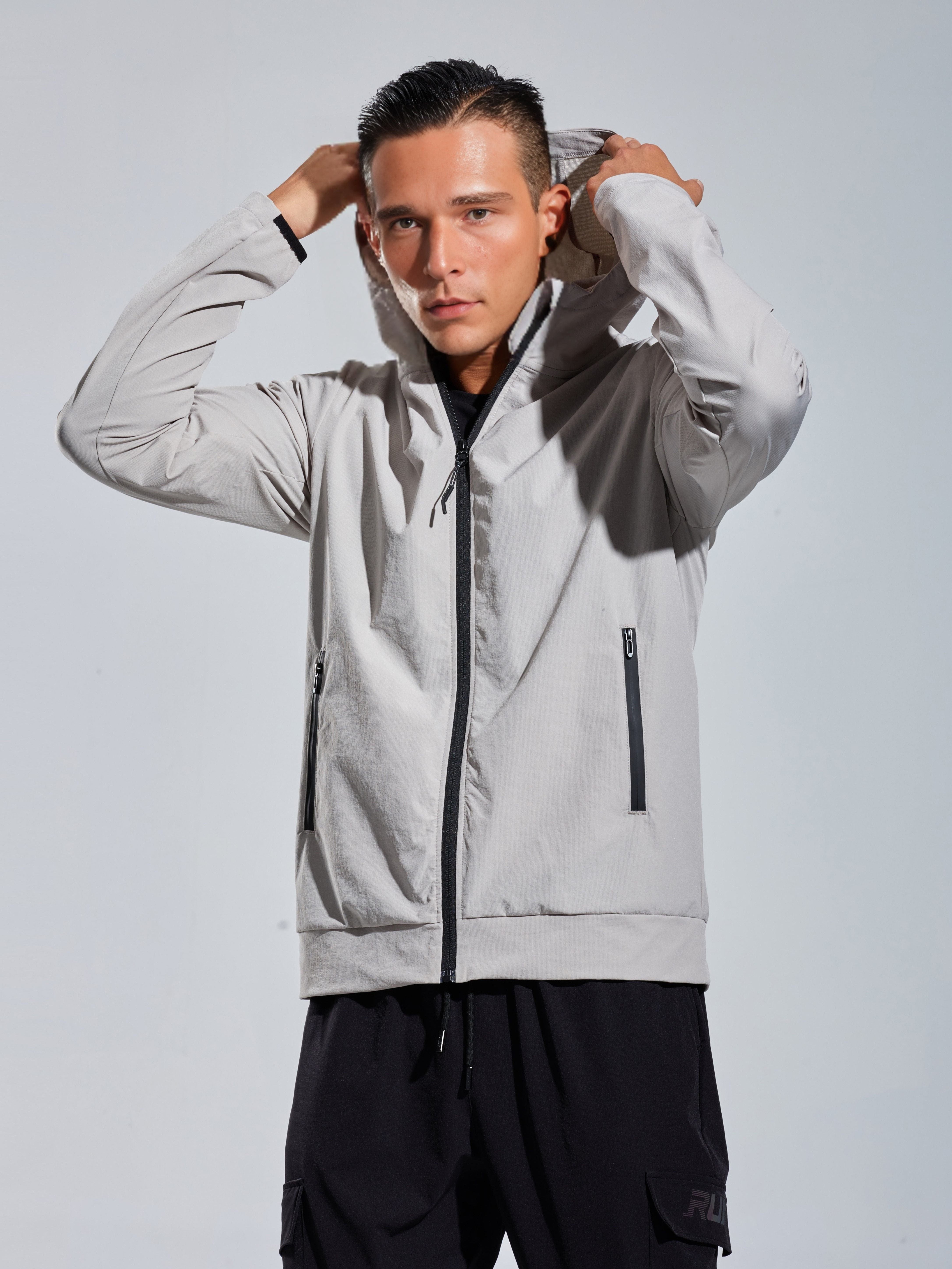 RUNNR AeroShield™ — Lightweight Hooded Running Jacket